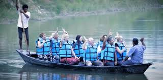 Tourists are enjoying the canoe ride.